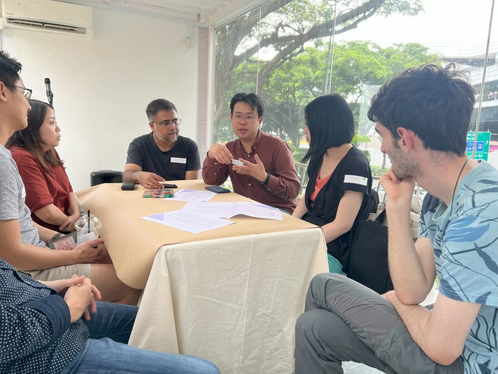 Gim Siong (4th from left) sharing about Smitten Ice Cream bar.